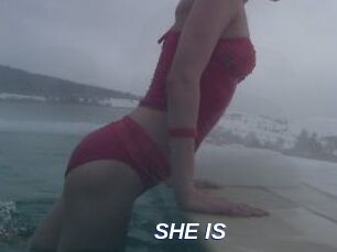 SHE_IS